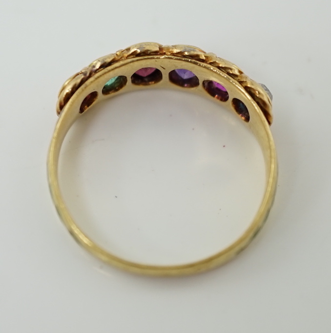 A 19th century gold, two colour enamel and graduated multi gem set 'Regard' half hoop ring